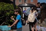Students move into their dorms with the help of their families on move-in day. 