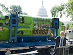 James Cameron speaks in front of his Deepsea Challenger submersible near the U.S. Capitol in June 2013.