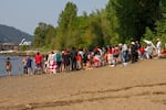 Dozens of attendees gathered under the St. John’s Bridge at the shore of the Willamette River on Sunday Sept. 8, 2024 for a water ceremony.