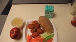 On Wings Wednesday at North Salem High School, students can order buffalo wings, cilantro ranch, celery, a roll, and fruits and veggies on the side. It's one of several options in the cafeteria.