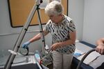 Dr. Carolyn Hale gets ready to use the laser tattoo removal machine at the Rogue Valley Correctional Facility in Grants Pass, Ore., on May 29, 2025.