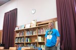 Teacher Mark Hardin loves his big spacious library at H.B. Lee Middle School - even with its large asbestos walls.