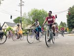 BIPOC bicyclists take part in Portland Black Liberation Ride through Portland, Ore, Friday, June 19, 2020. The ride is about celebrating Black joy by claiming space on the roads.