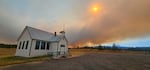 A provided image showing the Friend school with smoke from the Grasshopper fire burning in the Mt. Hood National Forest in Wasco County posted on July 28, 2026. 