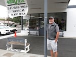 Scott Matthews of the 420Ville dispensary in Huntington, Oregon, hopes a drop of marijuana under his tongue every day will prevent cancer.