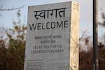 A sign welcomes tourists to the Velas Sea Turtle Conservation Area, in the western Indian seaside village of Velas, where olive ridleys come to nest.