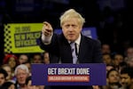 Britain's Prime Minister Boris Johnson speaks during his ruling Conservative Party's final election campaign rally at the Copper Box Arena in London, Wednesday, Dec. 11, 2019.