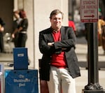 Sports writer and author John Feinstein poses in Washington, Feb. 28, 2006.
