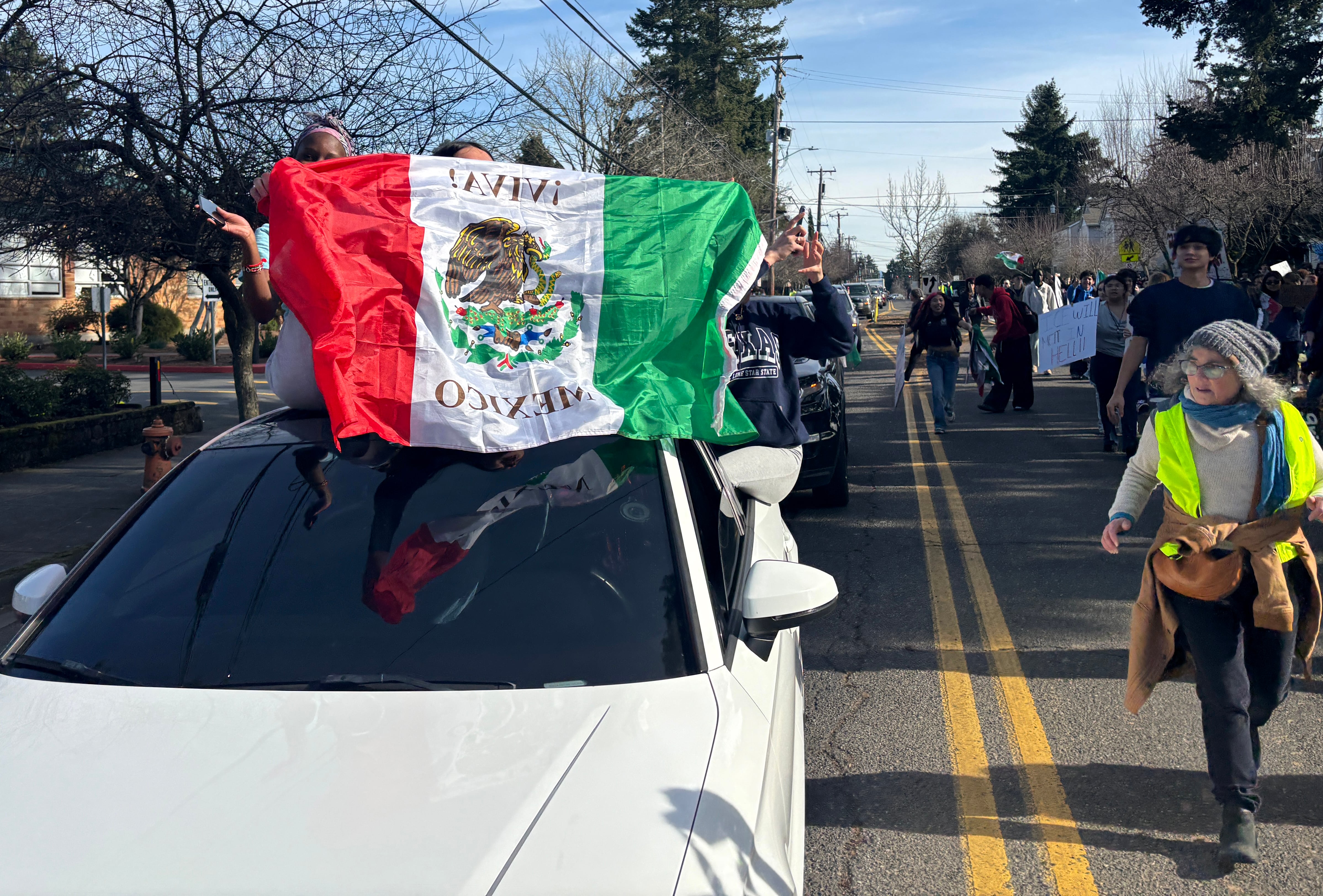 At several points of a David Douglas High School walkout against immigration and customs enforcement, cars and trucks rode alongside protesters in support. The high school’s Latino Student Union led the mid-day walkout.