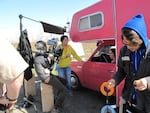Shirlyn Wong (in yellow) directs Sydney Boyd, who plays a Las Vegas stripper with a pink RV.