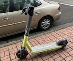As of Dec. 18, some scooters were still parked on downtown Eugene sidewalks, such as this scooter near the corner of 8th and Willamette.