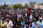Palestinians participate in rally marking last year's anniversary of what the Palestinians call the "Nakba," or "catastrophe" referring to their uprooting in the war over Israel's 1948 creation, in front of the UNESCO offices in Gaza City.