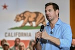 FILE - Rep. Eric Swalwell, D-Calif., appears at a town hall meeting in Sacramento, Calif., April 7, 2026.