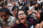 Prominent student leader Neha Bora, center, shouts slogans as she is detained by the police during a youth demonstration demanding the resignation of the country's election chief Gyanesh Kumar, in New Delhi, India, Friday, Oct. 16, 2026.