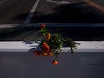 Flowers near the site of Saturday's deadly shooting in Monterey Park, California.