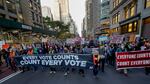 Demonstrators march down Fifth Avenue to advocate for the counting of all votes, Wednesday, Nov. 4, 2020, in New York. (AP Photo/Frank Franklin II)
