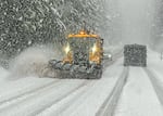 A plow with the Oregon Department of Transportation works the roads in the Cascades in Douglas County on Feb. 13, 2023. ODOT has said it will decrease some winter road maintenance due to a decline in revenue.