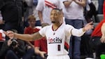 Portland Trail Blazers guard Damian Lillard pumps up the crowd. The Golden State Warriors defeated the Blazers 132-125 in Game 4 of the Western Conference Semifinals on Monday, May 9, 2016.
