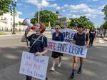 Protesters march near the U.S. Supreme Court to call for abortion rights protection on May 28 in Washington, D.C.