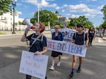 Protesters march near the U.S. Supreme Court to call for abortion rights protection on May 28 in Washington, D.C.