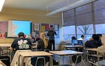 Teachers Steve Vancil, standing, and Galen Schmitt, seated, lead an "everyday" Integrated Math 2 class at David Douglas High School on March 24, 2023. Students in this class get twice as much math as their peers and have a higher passing rate.