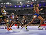 American Gabby Thomas cruises across the finish line to win the women's 200m final at the Paris Summer Games. St. Lucia's Julien Alfred took silver and Team USA's Brittany Brown won the bronze.