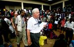 MONROVIA, LIBERIA - OCTOBER 11: Former U.S. President Jimmy Carter exits a polling site October 11, 2005 in Monrovia, Liberia. The Carter Center, founded by Carter to promote peace initiatives and health issues worldwide, is in Liberia to monitor the elections along with the National Democratic Institute. Liberia, beset by 13 years of savage civil war and two years of uncertain peace, held internationally-monitored elections October 11, a landmark achievement after two years of United Nations military occupation. (Photo by Chris Hondros/Getty Images)