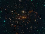 One early target for the James Webb Space Telescope is a cluster of distant galaxies known as SMACS 0723. The gravitational field of these galaxies acts as a cosmic lens, allowing the telescope to look at far more distant and older parts of the universe.