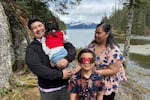 Michael Pese and his wife, Tupe Smith, pose for a photo with their son Maximus and daughter Cataleya in Whittier, Alaska, May 13, 2025.