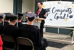 In this photo provided by the Oregon Department of Corrections, Colette Peters speaks at a Columbia River Correctional Institution GED graduation in 2019. 