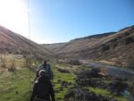 Hiking to a fishing spot on the Deschutes River.