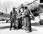 Cadets training to join the first Black combat unit in the U.S. Army Air Corps are seen with an instructor in Tuskegee, Ala., on Sept. 5, 1942.