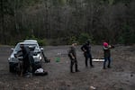 Ross Eliot (center, left) and Rosie Strange (right) take target practice with other activists on Feb. 2, 2019 in Hood River, Ore.