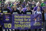 SEIU workers at the University of Oregon in Eugene celebrate reaching a tentative agreement on a new labor contract, Monday, Sept. 28, 2026.