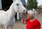 Terry Crawford, next to her horse Ben, at her home in Christmas Valley. She moved to the area 16 years ago, but is growing concerned about the potential of developers building a new landfill in the area.