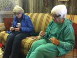 Helen Hardwick, left and Helen Patton talk about the refuge occupation during knitting group in Burns.