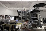 NSO and KIS engineers and scientists work on the Visible Tunable Filter (VTF) inside the Coudé Lab at the Inouye Solar Telescope.