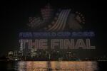 A drone show takes place displaying the message "FIFA World Cup 2026 The Final" with the graphic representing the host countries of Canada, the United States and Mexico, in front of the Lower Manhattan skyline on Friday in Jersey City, N.J.