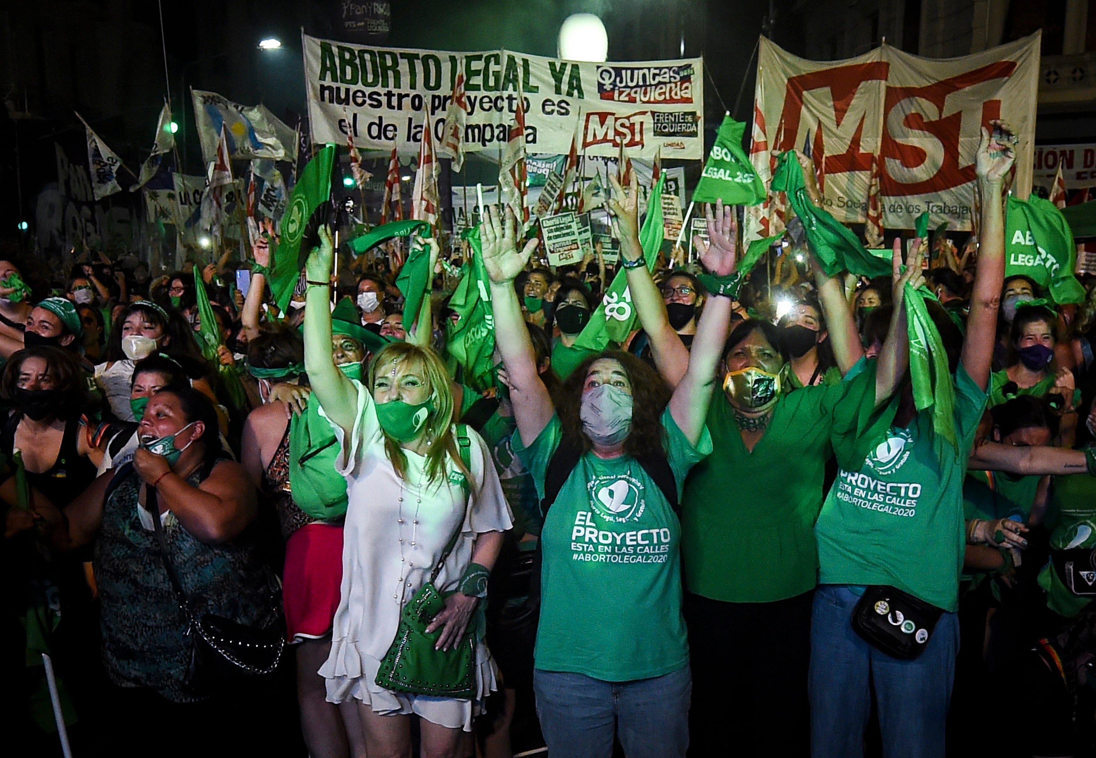 Demonstrators celebrate after the right to an abortion is legalized on Dec. 30, 2020, in Buenos Aires, Argentina.