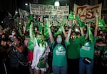 Demonstrators celebrate after the right to an abortion is legalized on Dec. 30, 2020, in Buenos Aires, Argentina.