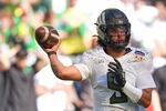 Oregon quarterback Dante Moore passes during the first half of the Orange Bowl College Football Playoff quarterfinal game, Thursday, Jan. 1, 2026, in Miami Gardens, Fla.