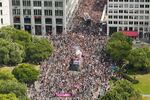 Revelers march down the Leipziger Strasse street during a Pride parade in Berlin, July 23, 2022.