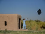 An Afghan boy flies a kite on the outskirts of Herat in September 2021. 