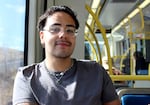 Sass Sanchez rides the MAX Green Line towards the Gateway Transit Center to transfer to another train in Portland, Ore., Aug. 26, 2026. Sanchez said he thinks the recent cuts and changes to TriMet services could lead people away from using TriMet, which is looking for additional revenue to prevent further cuts.