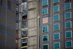 Construction crews work on the future Hyatt Regency hotel at the Oregon Convention Center in Portland, Oregon, Saturday, Jan. 5, 2019.