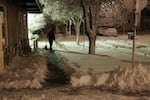 A man shovels the walk outside Northwest Primary Care on Milwaukie Avenue in Portland's Sellwood neighborhood during a snow storm on Wednesday, Jan. 11, 2017.