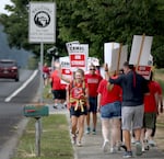 Members and supporters of the Camas Education Association demonstrate outside of Camas High School on Aug. 28, 2023. The strike appears to be the school district's first ever, according to union and district officials.