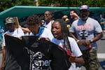 Legacy Garner, Eric Garner's youngest daughter, center, marches with family and supporters during an event to memorialize Eric Garner in the Staten Island borough of New York, Wednesday, July 17, 2024.