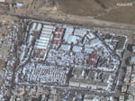 A 03 December satellite image shows Palestinian civilians sheltering around a college in the Gaza city of Khan Yunis. AI systems can analyze such imagery faster than a person.