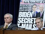 With a poster of a New York Post front page about Hunter Biden on display, House Oversight Committee Chairman Rep. James Comer and Rep. Jim Jordan R-OH listen during a Feb. 8, 2023 hearing.